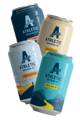 Five cans of Athletic Brewing Co. non-alcoholic brews on a white background