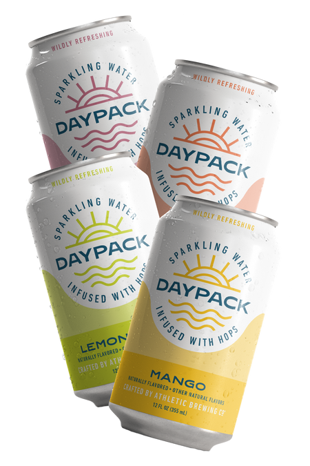 A collection of DayPack sparkling water cans in a variety of flavors including black cherry, mango, lemon lime, and blood orange.