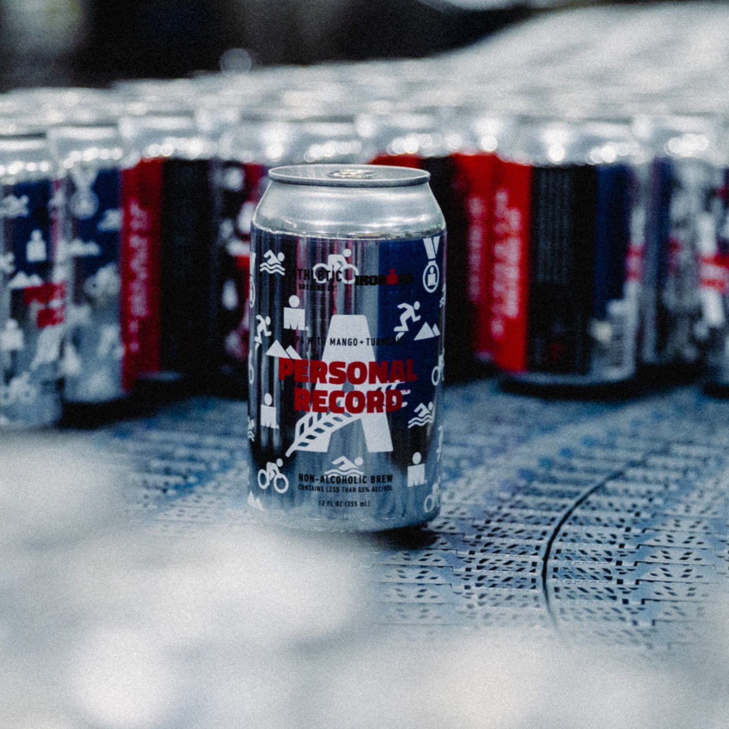 Close-up of a Personal Record IPA can on the production line.
