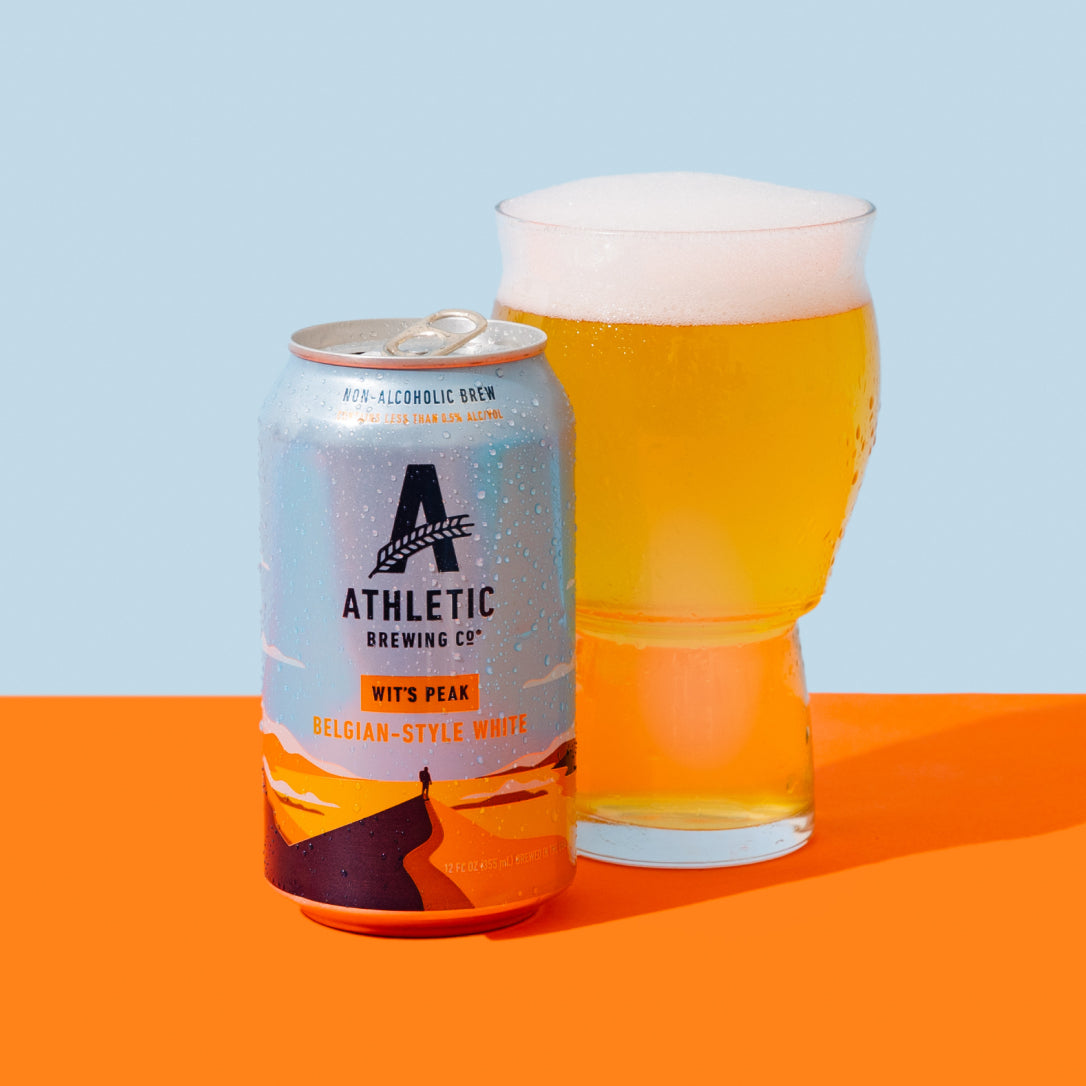 can of Wit's Peak next to a glass