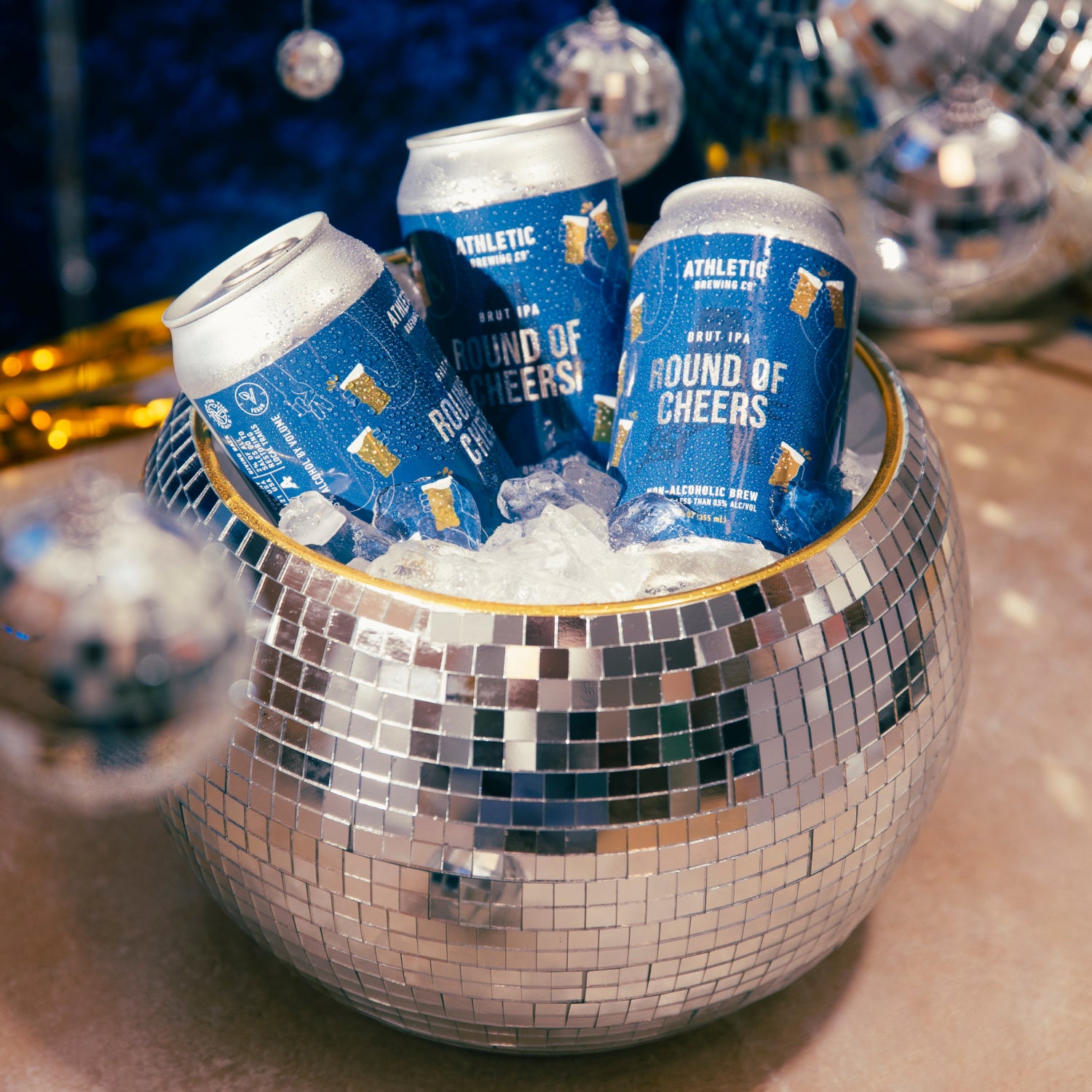 Round of Cheers can in a disco ball bowl