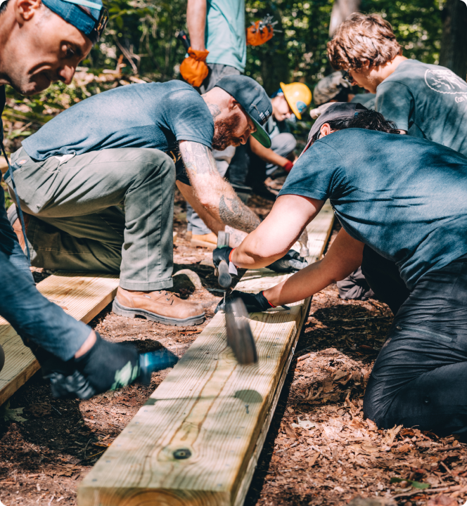 team repairing trail