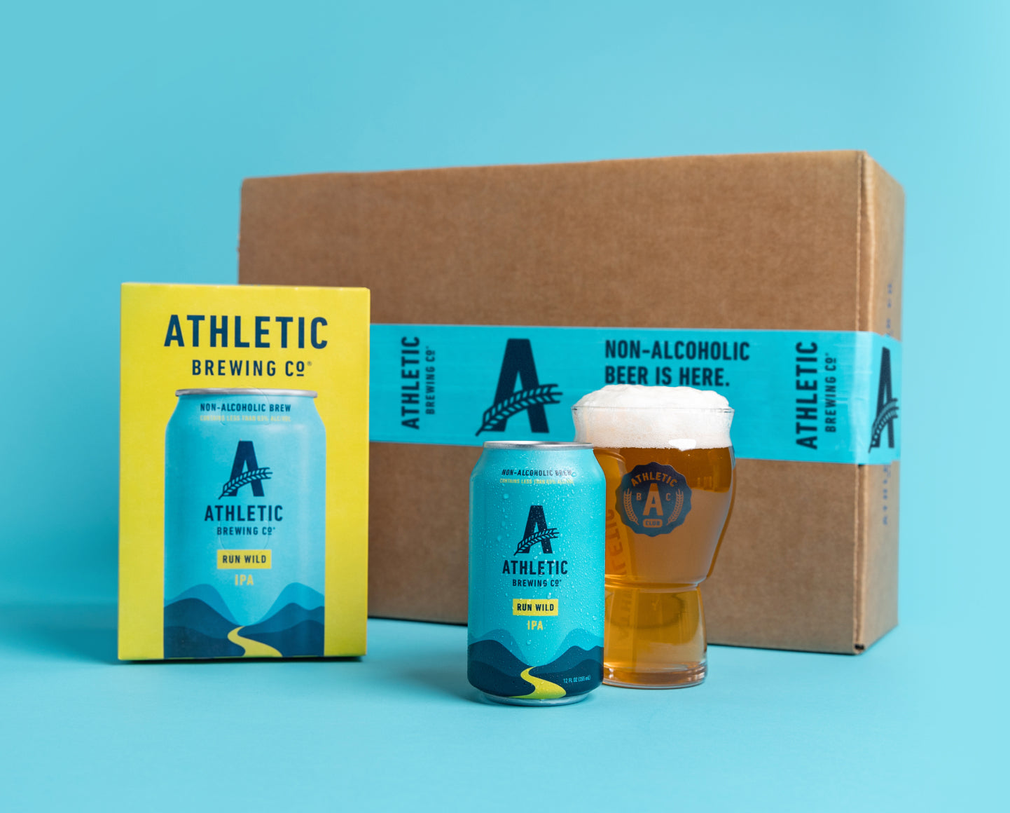 Run Wild box, can and glass of NA beer