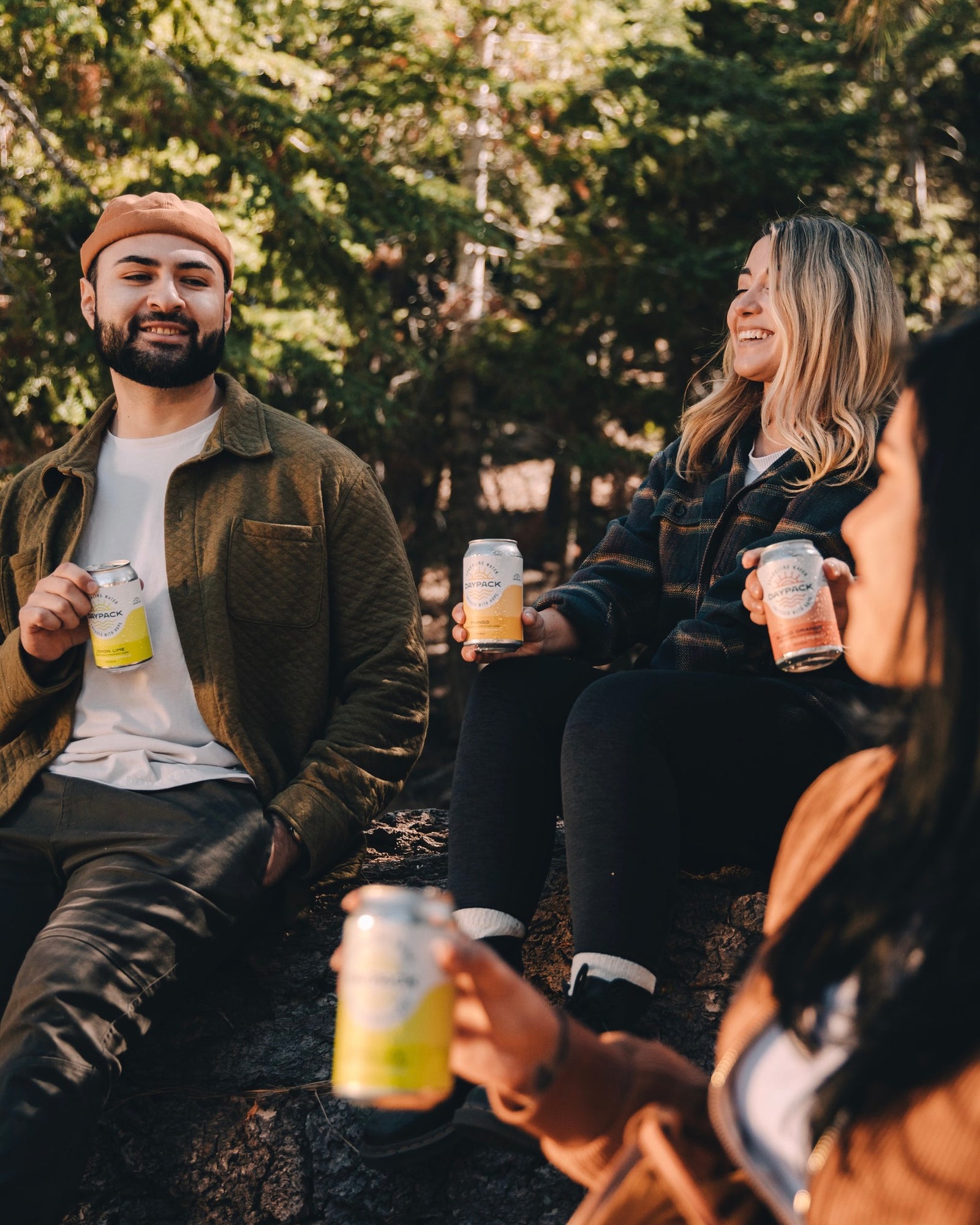 3 people enjoying Athletic NA beer