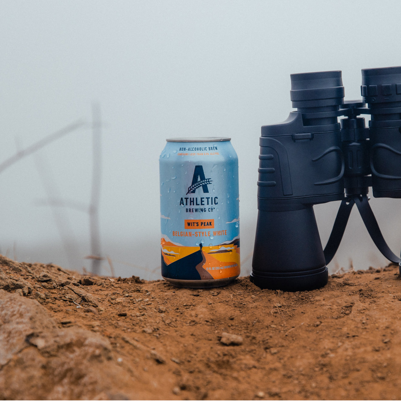 can of Wit's Peak  on ledge with binoculars