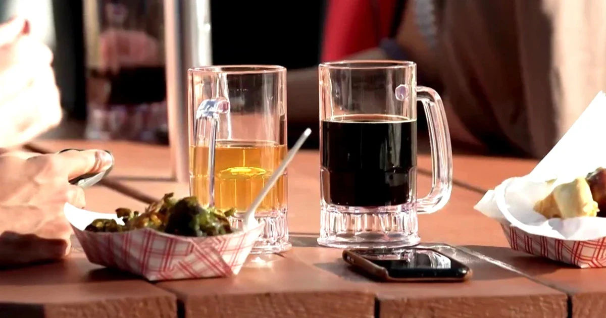 Two glasses of beer on a table