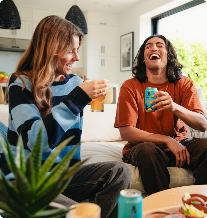 happy people drinking athletic