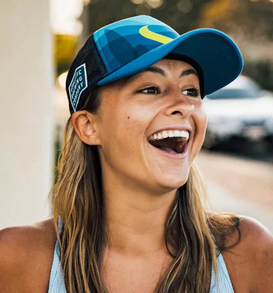 woman wearing hat smiling