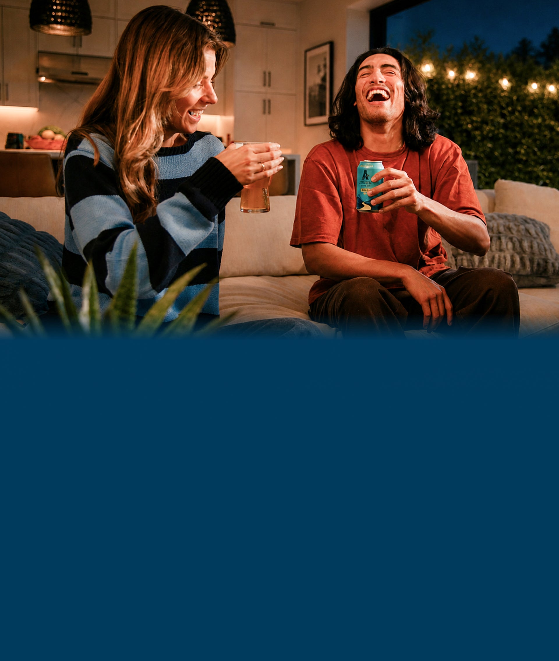 people enjoying brews on couch