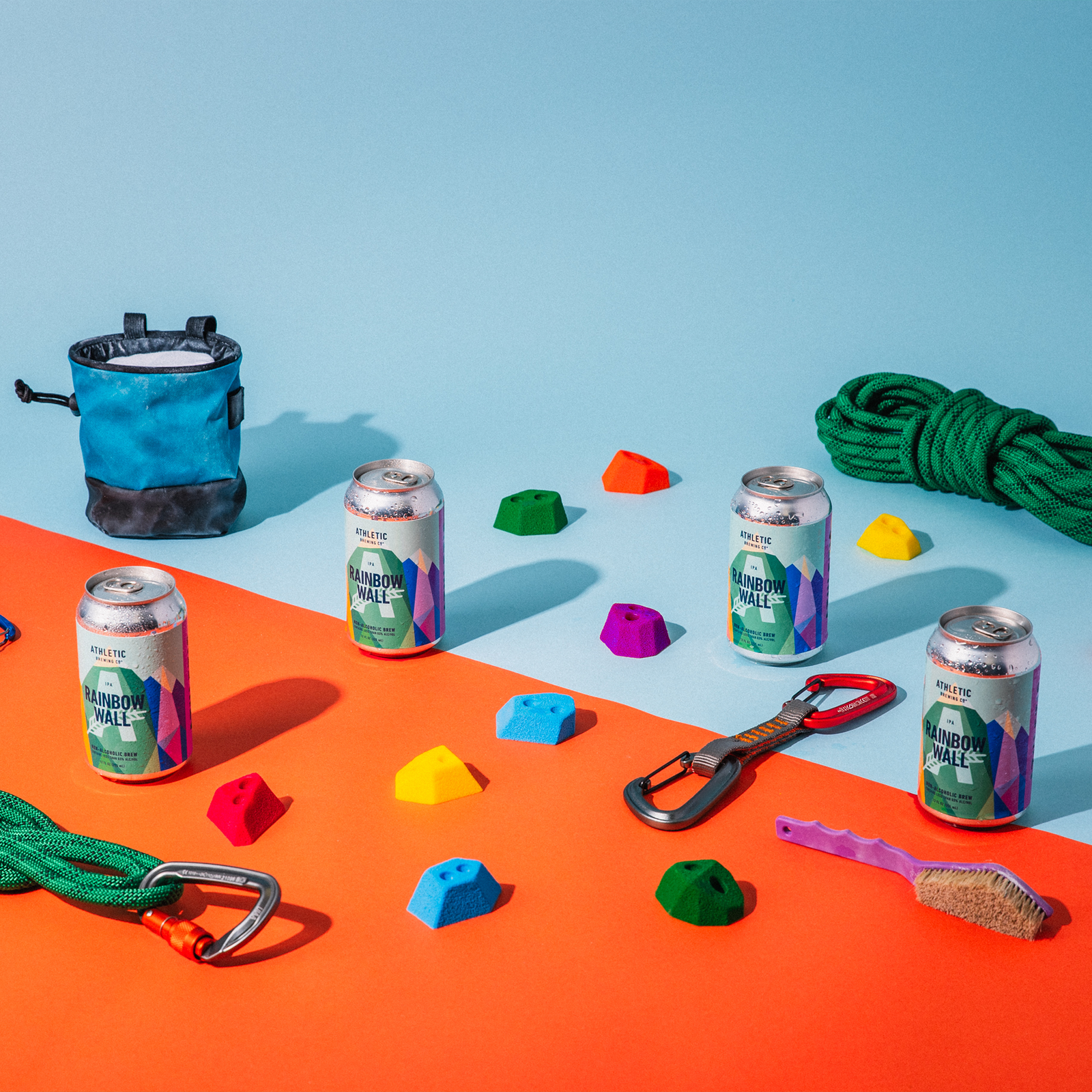 Rainbow Wall cans surrounded by climbing gear