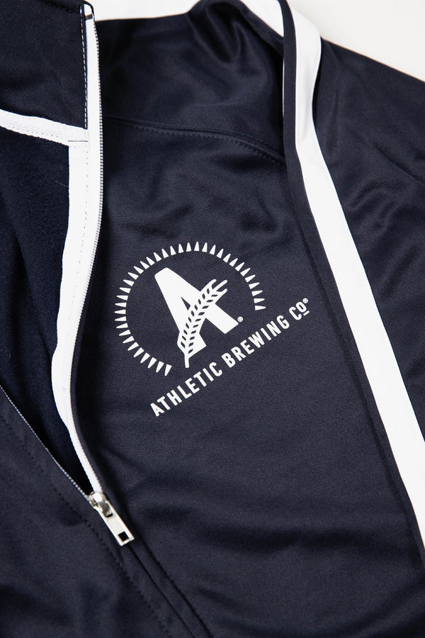 https://athleticbrewing.com/cdn/shop/products/Athletic-Brewing-Co-Unisex-Track-Jacket-2.jpg?v=1674166505&width=600